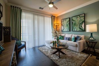 a living room with a couch and a table